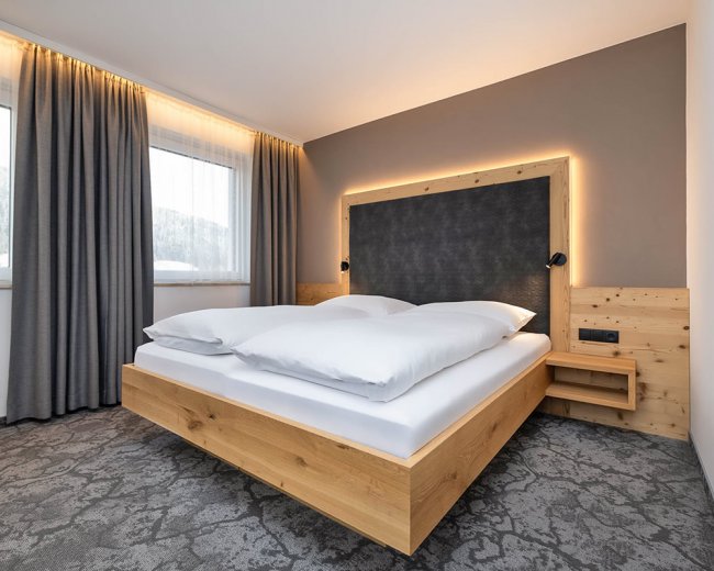 Wohnbeispiel Familiensuite "Alpin" mit Balkon